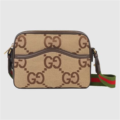 tracolla gucci tessuto gg grande donna|Tracolla GG in tessuto Supreme beige ed ebano .